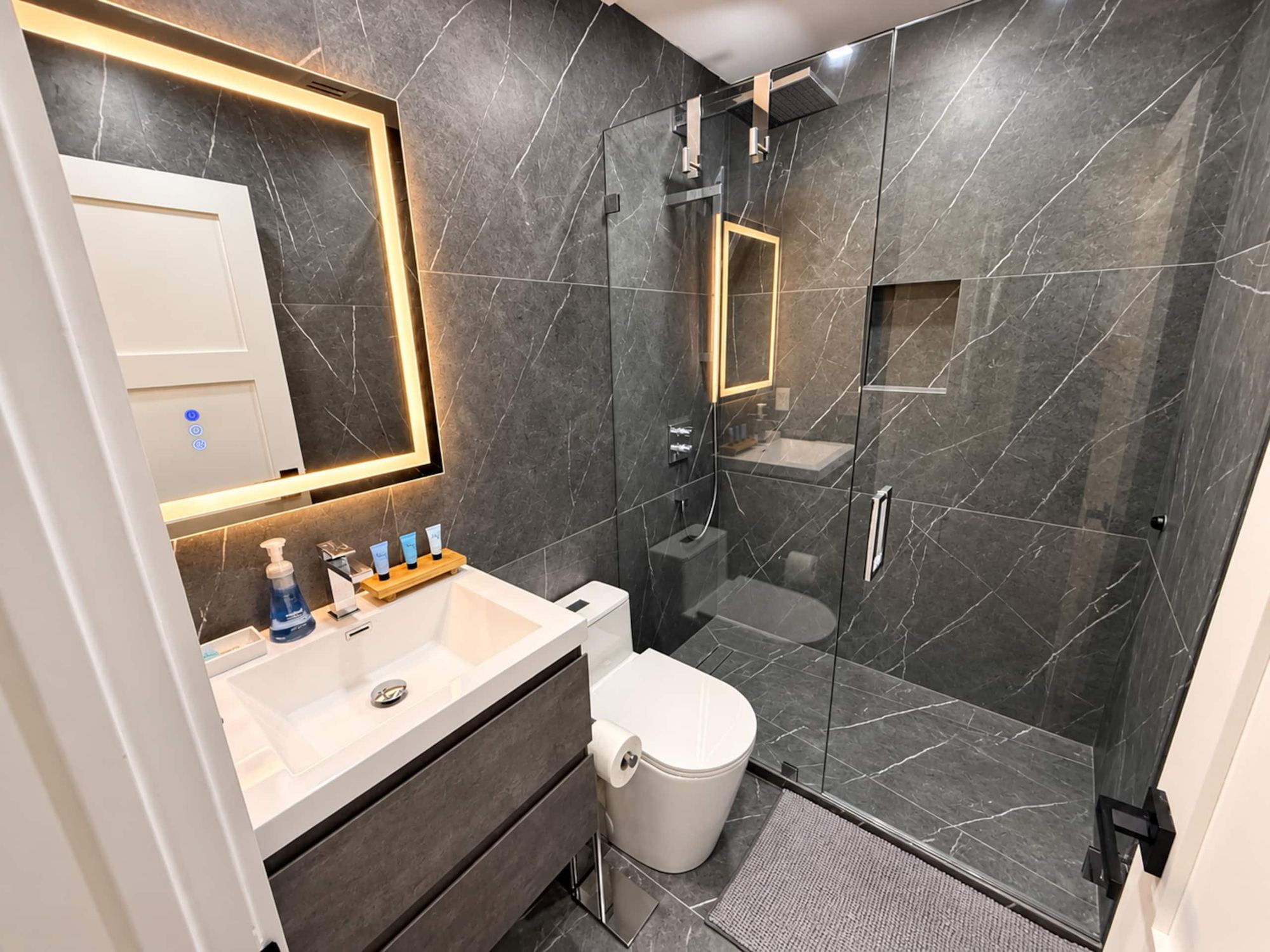 Bathroom with walk-in glass shower